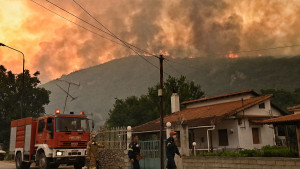 A major forest fire in Greece forces several villages to evacuate