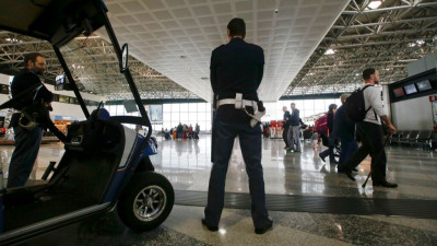 Passengers evacuated from Italian airport after 'lunatic' starts fire