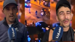 دموع تاجر مغربي بعد بتر يد مساعده السنغالي في أحداث الولفة..ومناشدة للسلطات بالتدخل العاجل